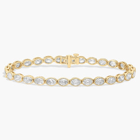 7 " Oval Cut Diamond E/W Bezel Set Tennis Bracelet In 14K Yellow Gold (8 Ct. tw. - H-I / SI1-SI2)