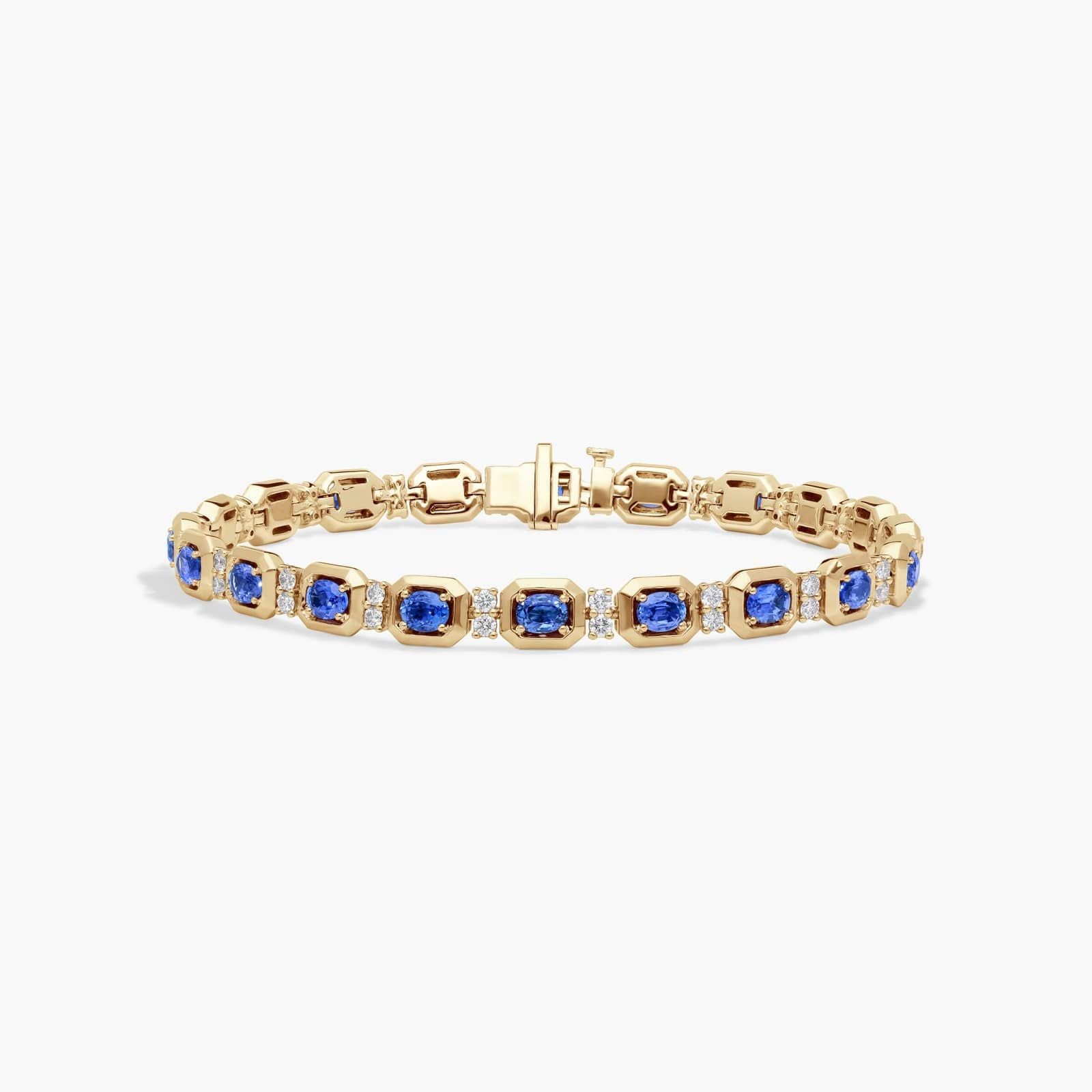 Oval Cut Blue Sapphire and Diamond Alternating Tennis Bracelet In 14K Yellow Gold