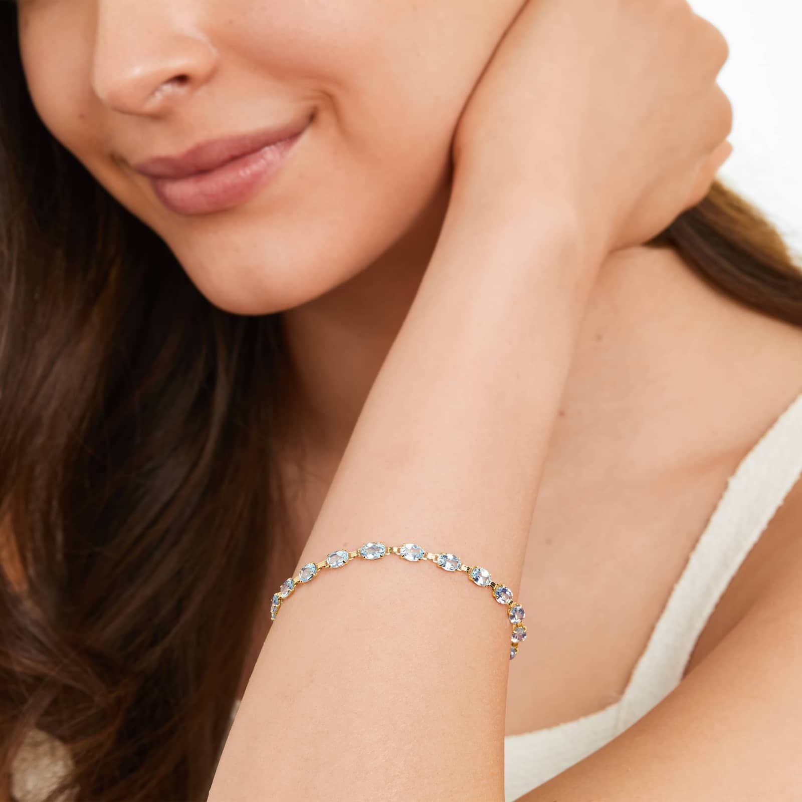 Blue Topaz Line Bracelet In 14K Yellow Gold