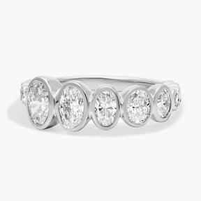 Oval Cut Graduated Lab-Grown Diamond Bezel Ring In 14K White Gold